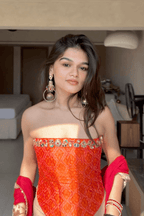 Ruhani - Orange Ikat Corset with Rose Gold Fishcut Lehenga and Kundan Work