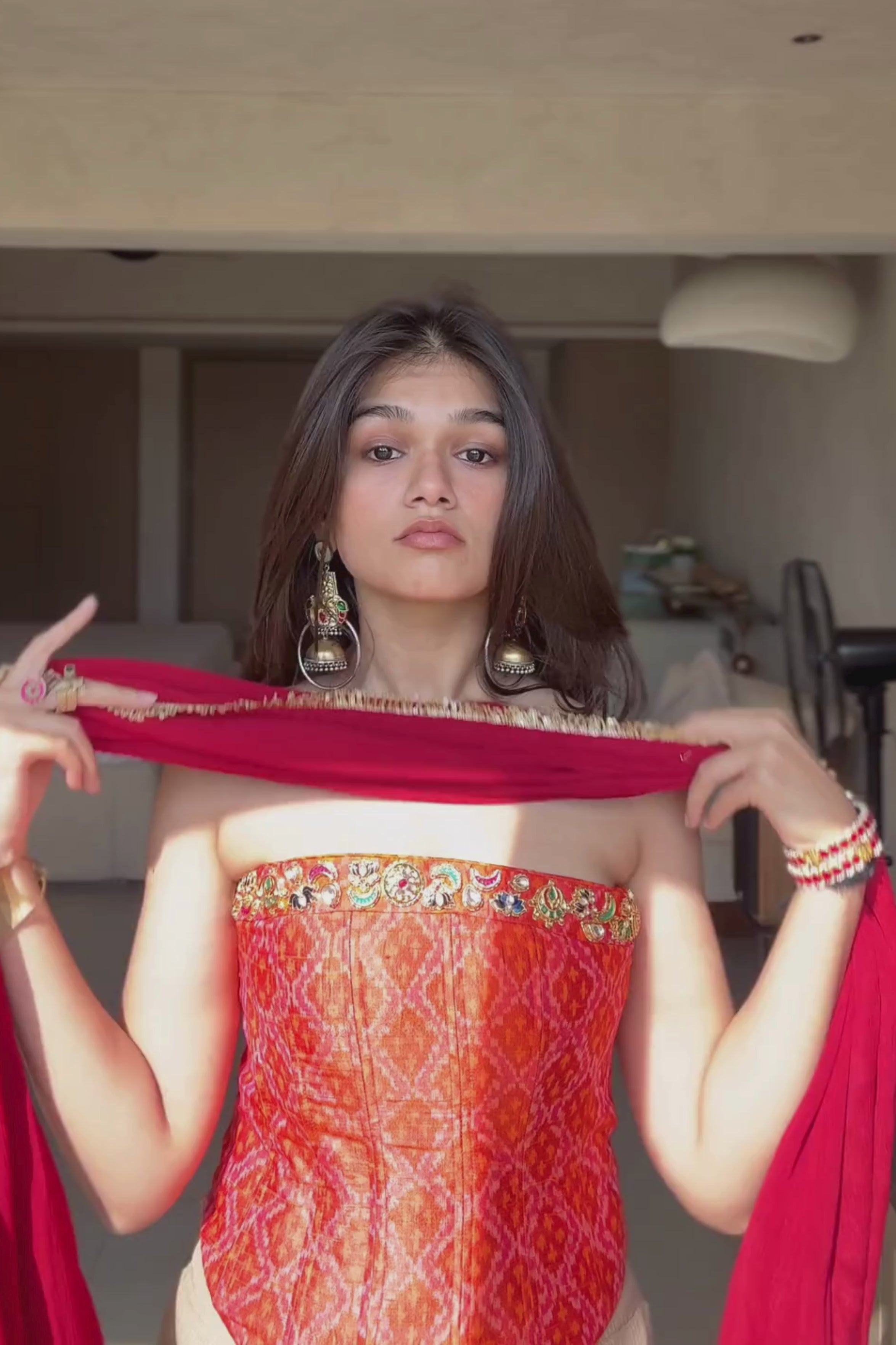 Ruhani - Orange Ikat Corset with Rose Gold Fishcut Lehenga and Kundan Work